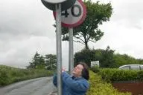 Christina Jebb by speed limit signs